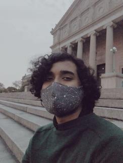 Picture of Wahid Al Mamun in front of columns and steps.